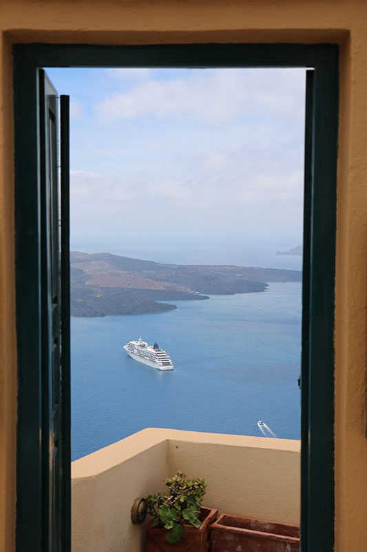 Cruise ship framed through a window